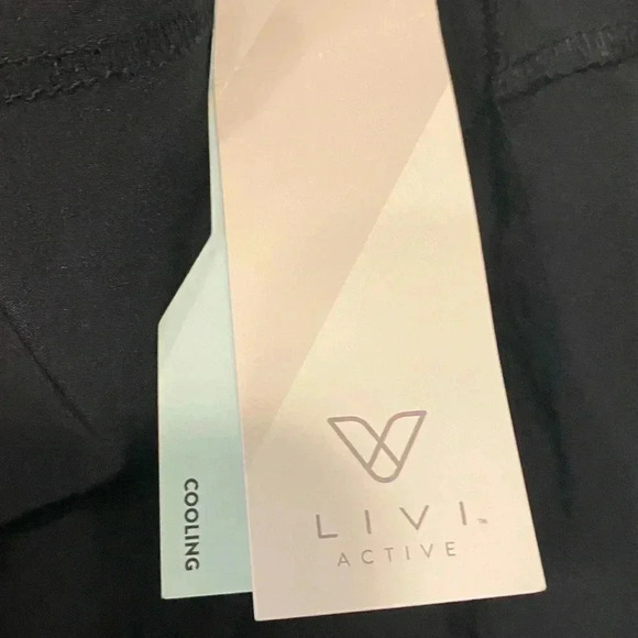 LIVI Active skirt with built in short. Adorable pleated detail in back 14/16 - Picture 5 of 6